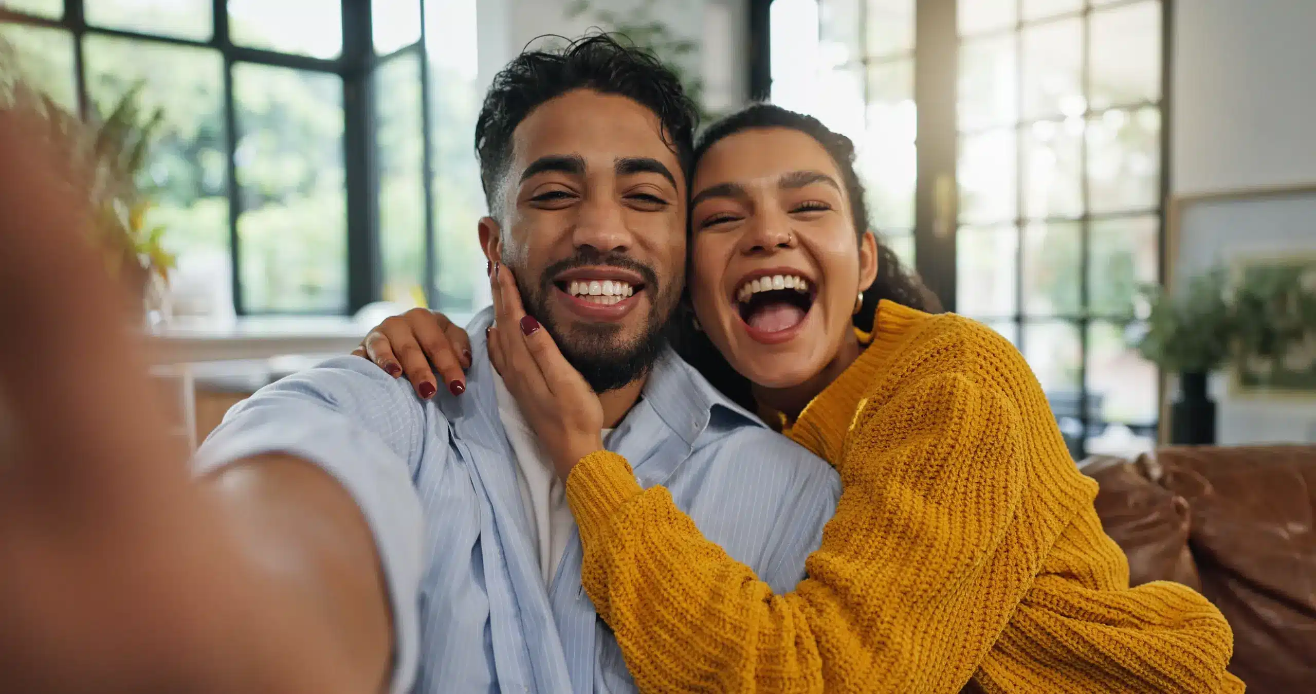 Happy couple smiling together in Chambersburg, PA, showing confident and healthy smiles